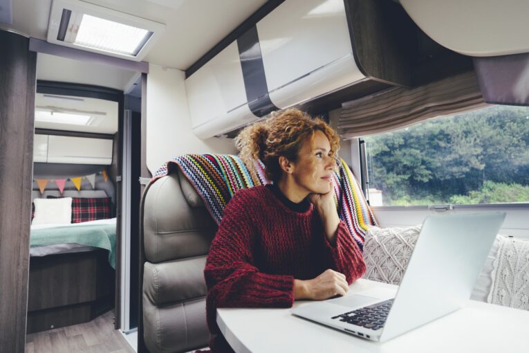 woman does remote work from RV