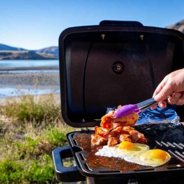 cooking bacon on the best RV grills 2022