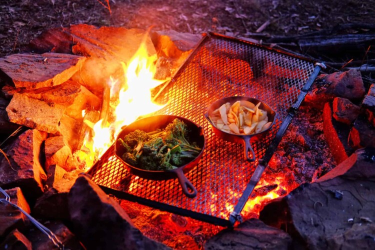 cast iron skillet over campfire for RV cooking