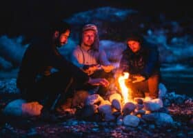RV friends around campfire