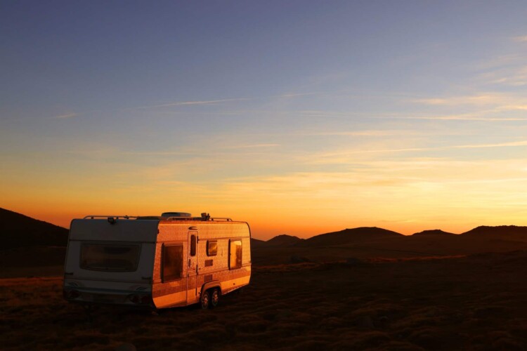 RV camping in summer at sunset