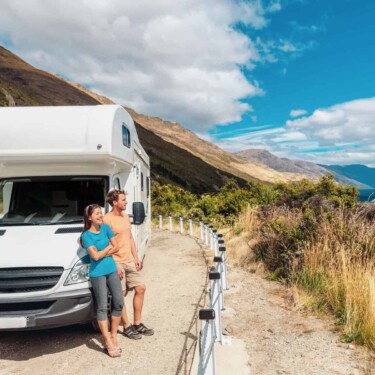 sustainable camping motorhome couple on the coast