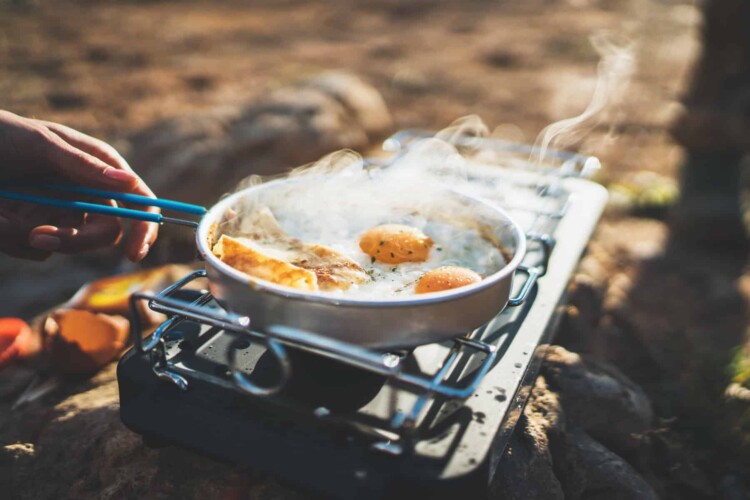 Cook outside to keep heat out of your RV. (Image: Shutterstock)