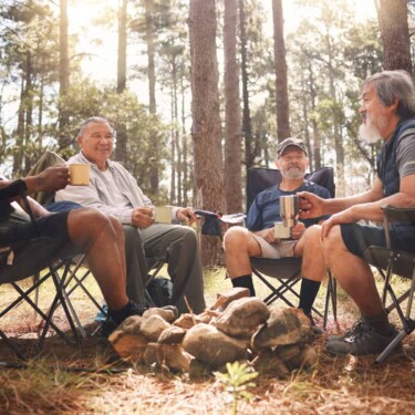 old friends enjoying affordable RVing with group travel