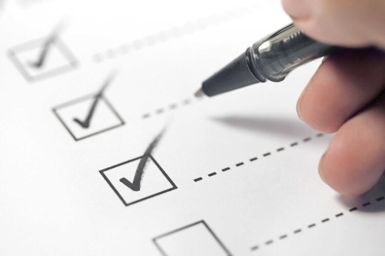 Hand,With,Black,Pen,Marking,On,Checklist,Box. Image: Shutterstock