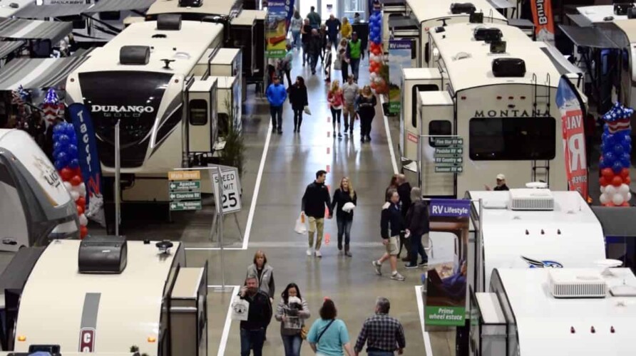 Fifth wheel RVs with crowd shopping at RV show. Image: Dave Helgeson