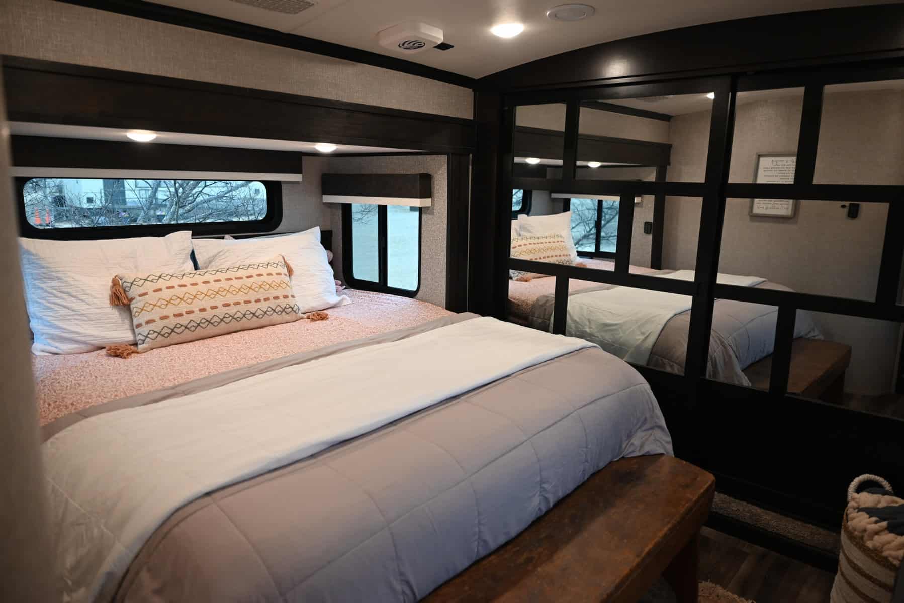 better sleep in RV bedroom with cozy bedding and shades